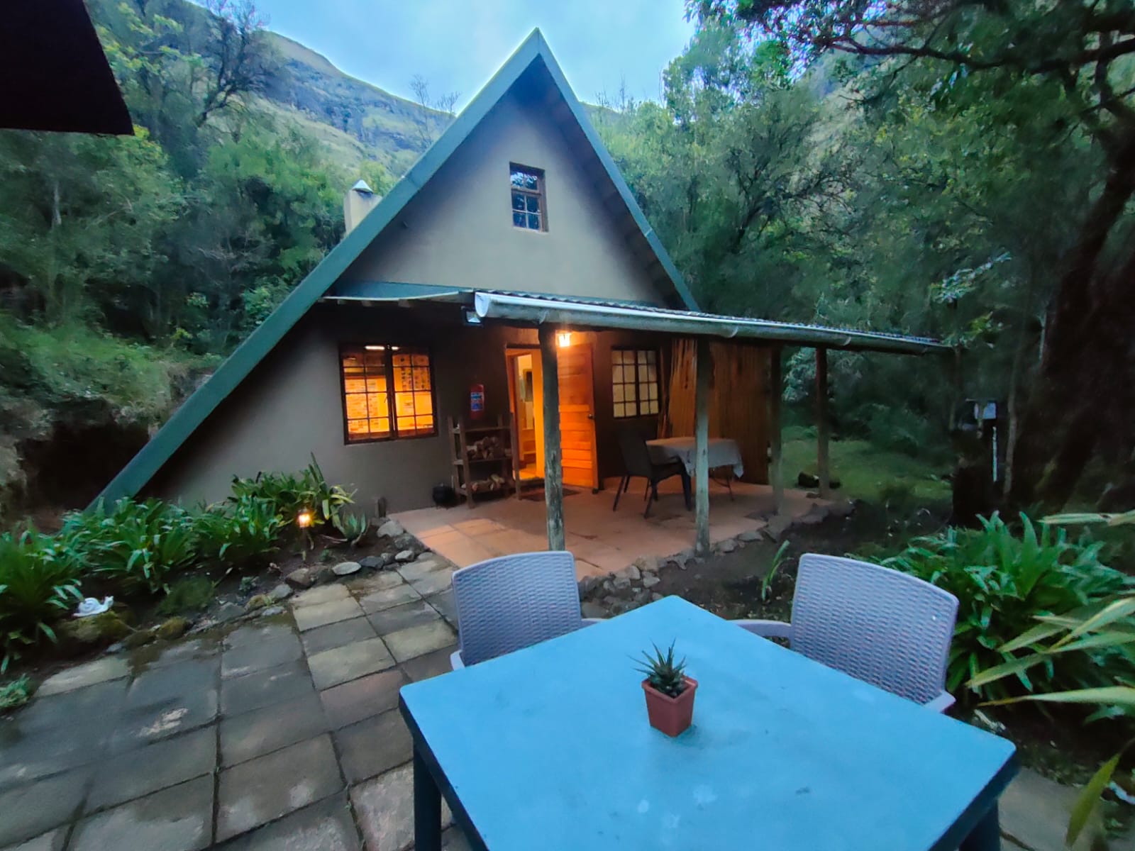 Inyoka cabin and its patio in the indigenous forest
